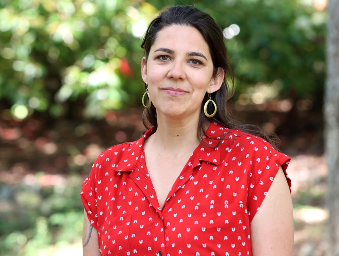 Becky Thiessen, wearing a red and white polka dot shirt.