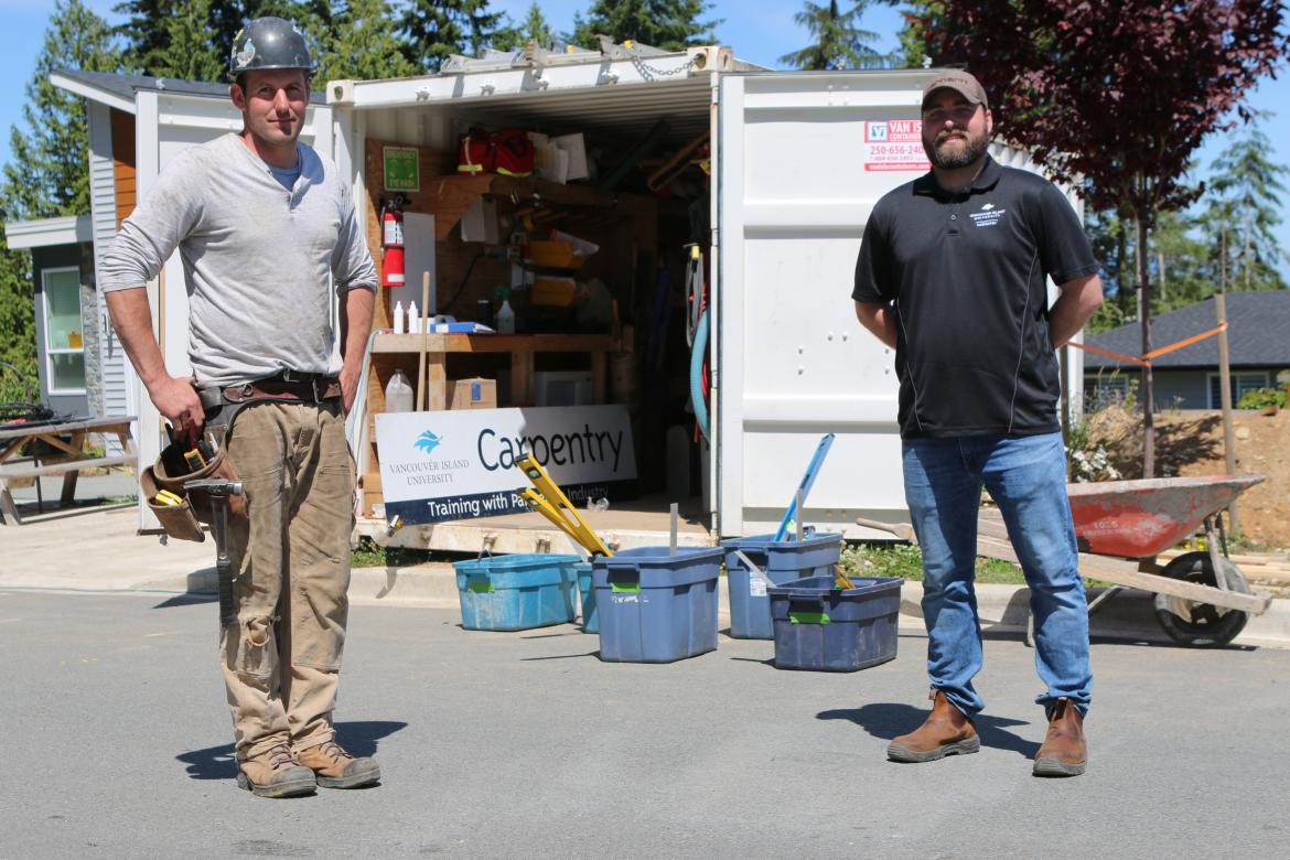 VIU Carpentry Instructors Joe Blain and Cam Frenette at KSG Consulting Ltd. worksite. VIU Building Partnerships for Hands-on Learning Experiences